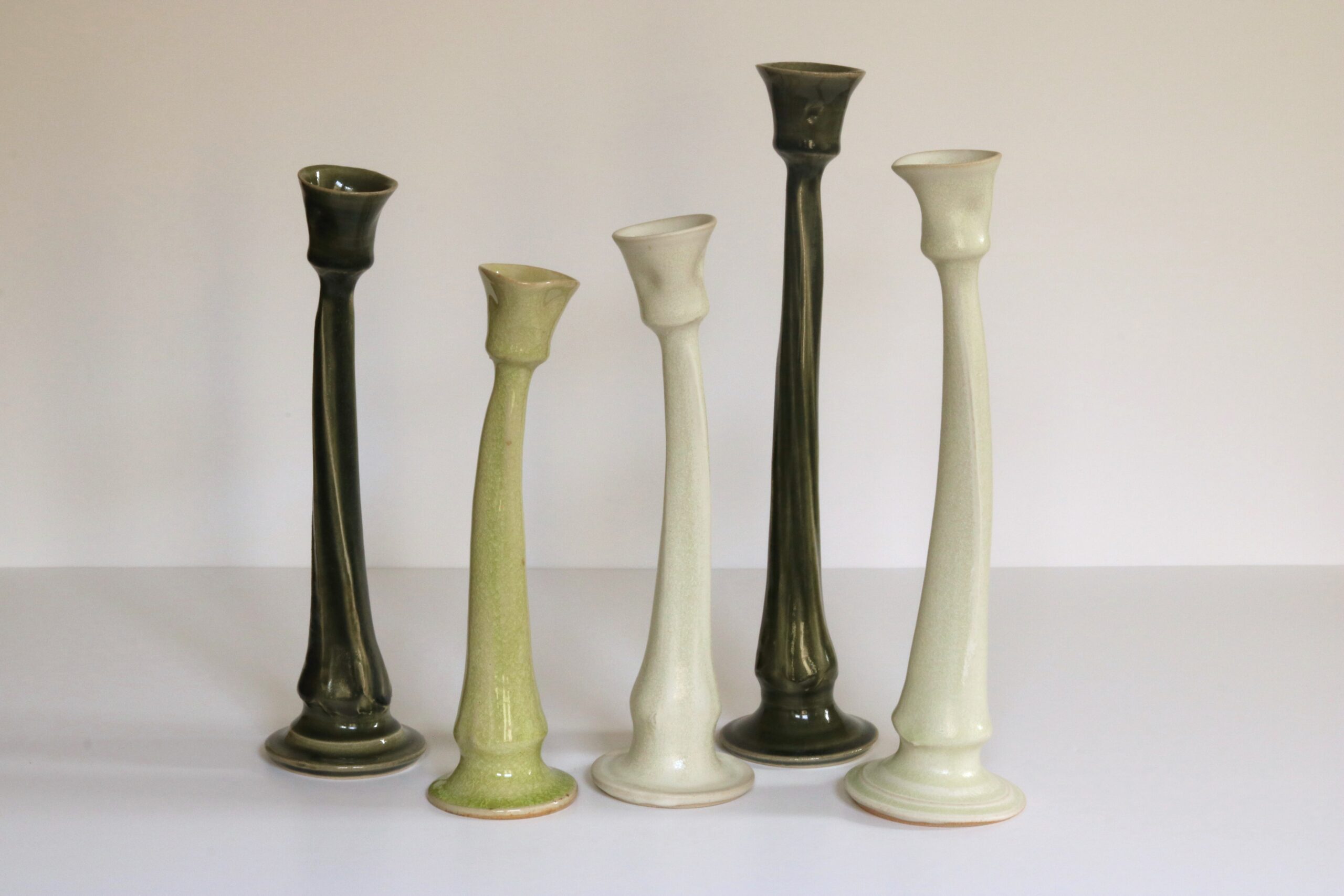 Thrown and altered stoneware, wood
ash green, chartreuse crackle, dolomite, 24 - 33 cm, 2023