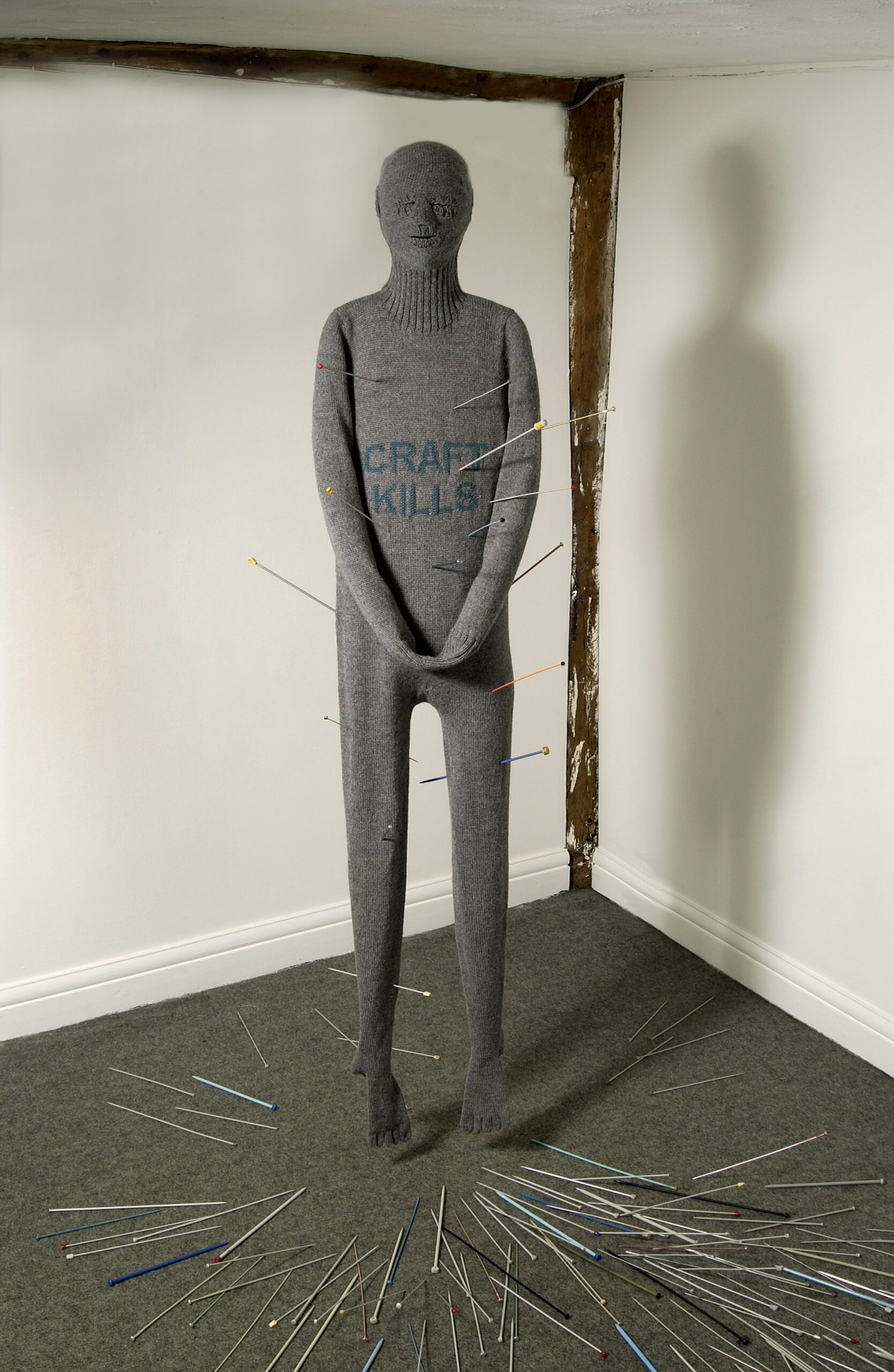 Craft Kills, Machine knitted wool, knitting needles, 2000 × 680 × 380mm, 2002. 
In the collection of the Crafts Council, London.
Photography: Douglas Atfield
